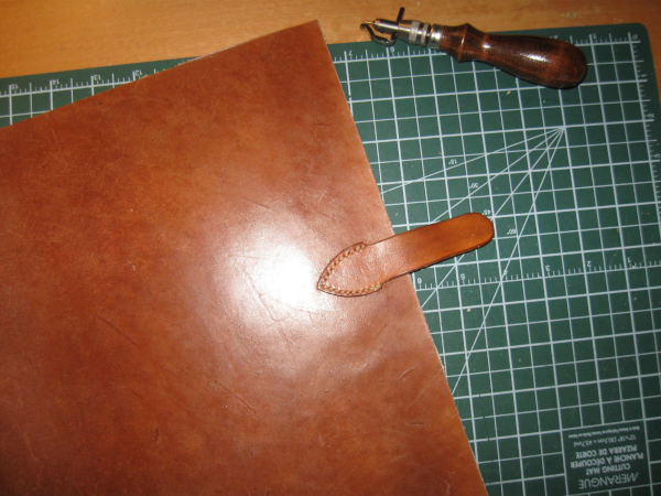 discbound notebook adding closure strap